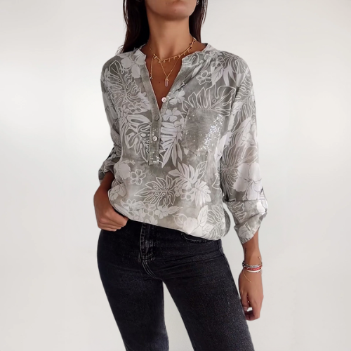 SHANA | BLOUSE MET BLAD PRINT EN PATCHWORK PAILLETTEN