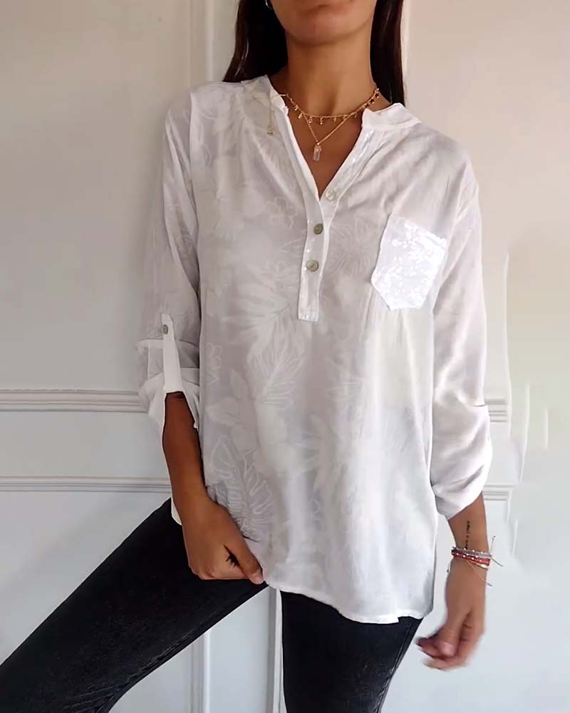 SHANA | BLOUSE MET BLAD PRINT EN PATCHWORK PAILLETTEN