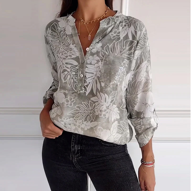 SHANA | BLOUSE MET BLAD PRINT EN PATCHWORK PAILLETTEN