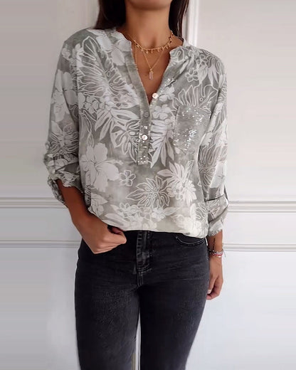 SHANA | BLOUSE MET BLAD PRINT EN PATCHWORK PAILLETTEN