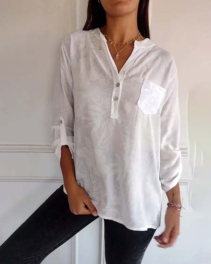 SHANA | BLOUSE MET BLAD PRINT EN PATCHWORK PAILLETTEN